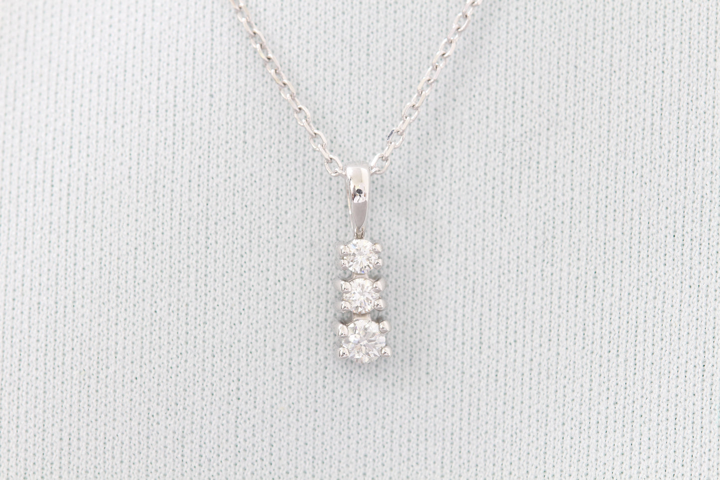 14k three stone diamond pendant