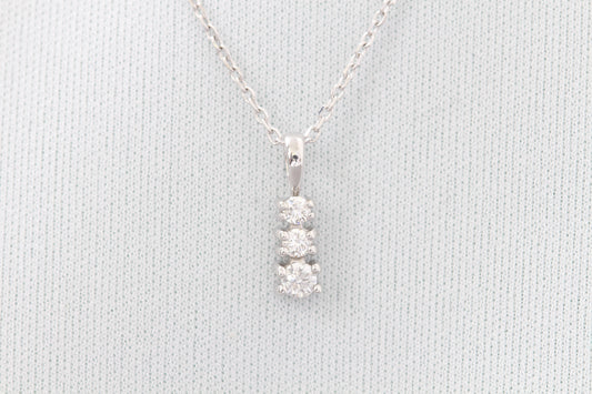 14k three stone diamond pendant