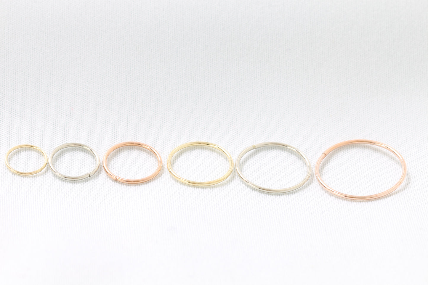 10k hoop earrings sleepers white, yellow, and rose gold.