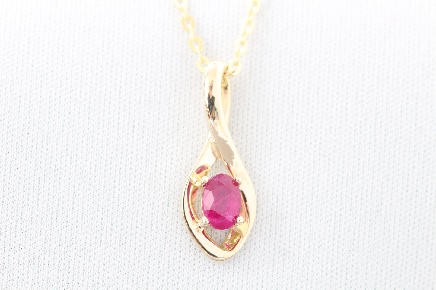 14k oval ruby pendant