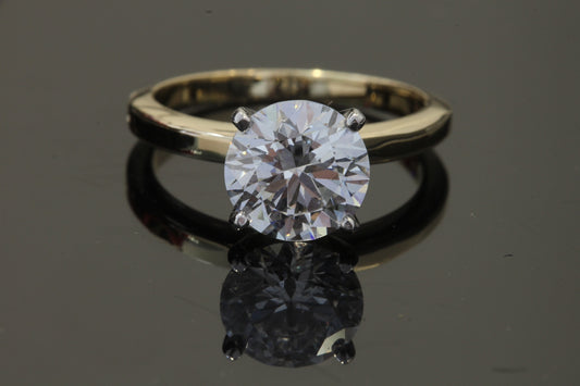 2.20 Carat Lab Solitaire 14k and platinum.