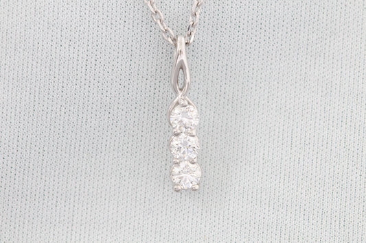 14k three stone diamond necklace