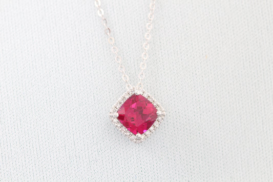 10k synthetic ruby and diamond pendant
