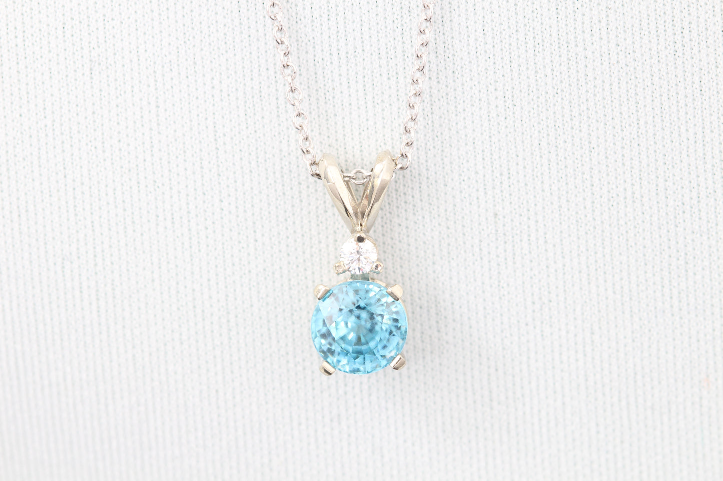 14k blue zircon and diamond pendant