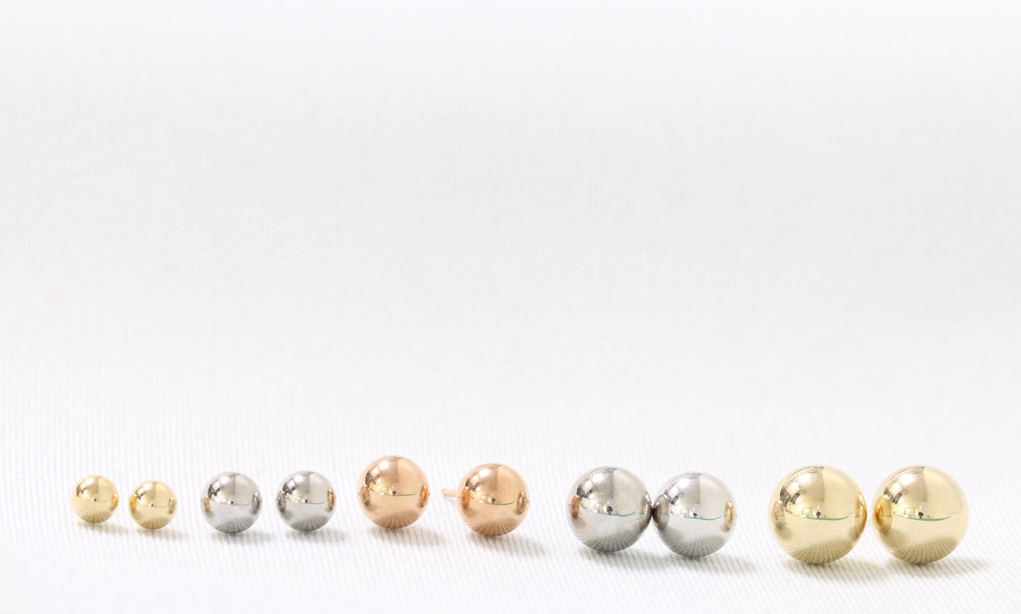 14k ball studs white, yellow, and rose gold.