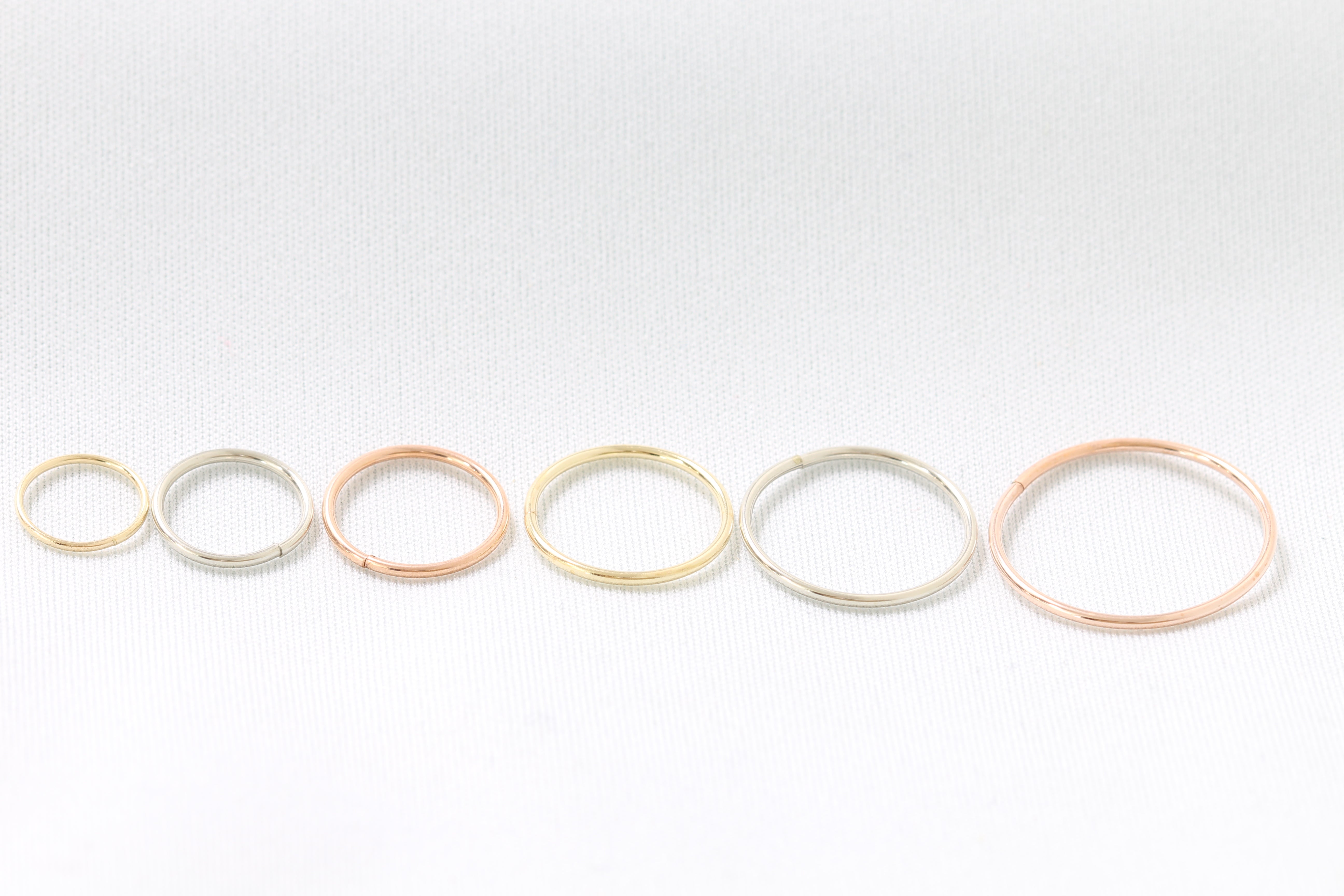 10k hoop earrings sleepers white, yellow, and rose gold.