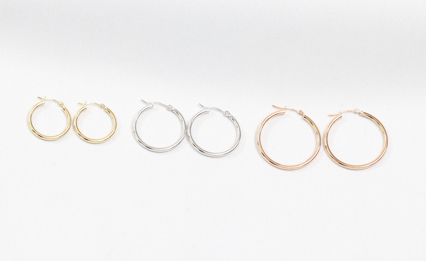 14k hoops earrings in yellow, white, & rose gold