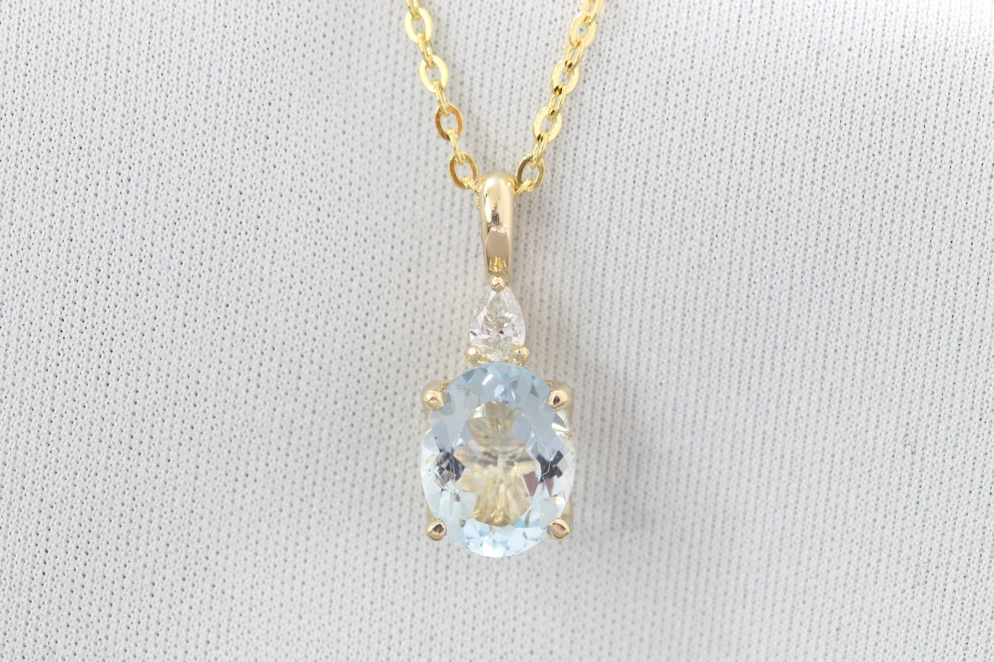 14k Aquamarine and diamond pendant
